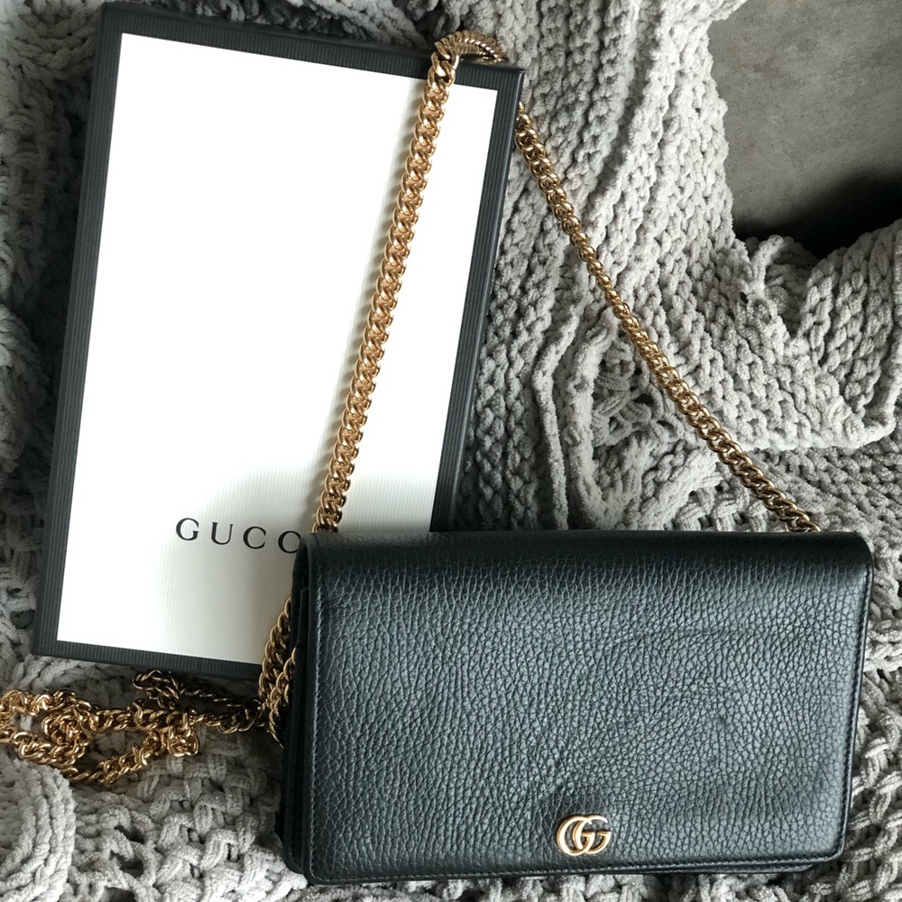 Gucci all black wallet on a chain